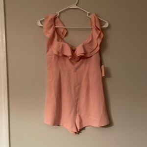 Super down light pink (blush) romper NWT
Size small Great condition
